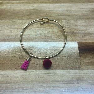 gold bangle bracelet with pink charms